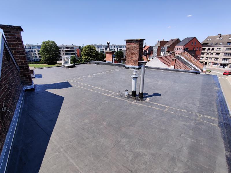 Na - vernieuwd plat dak Anderlecht